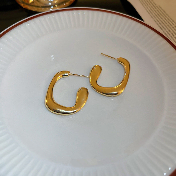 Gold geometric earrings Metallic cool style hoop earrings
