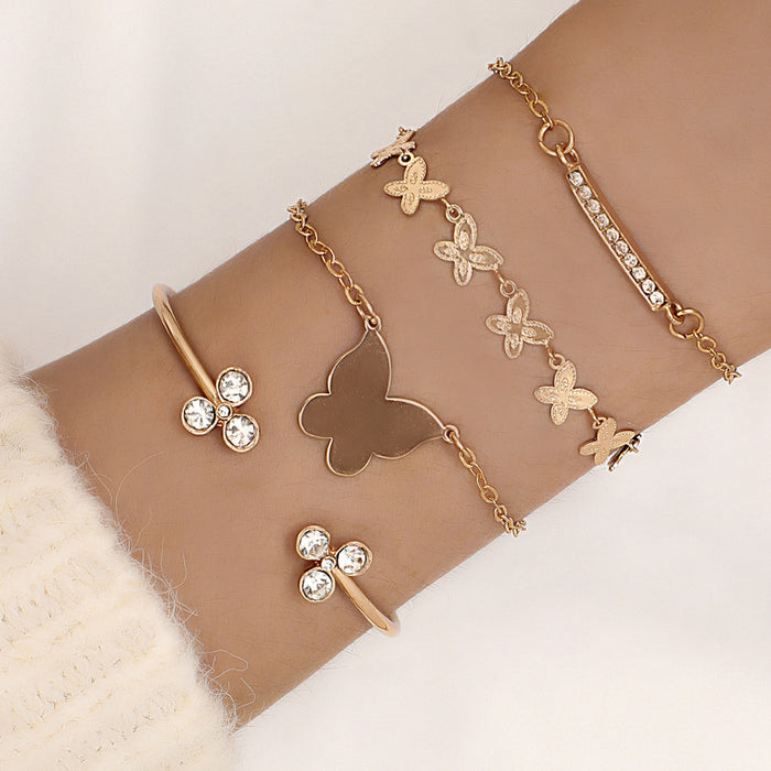 Luxe Heart and Leaf Bracelet with Butterfly Knot – Four-Layer Elegant Jewelry