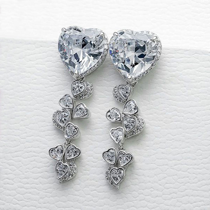 Pendientes largos con borlas y circonitas Love