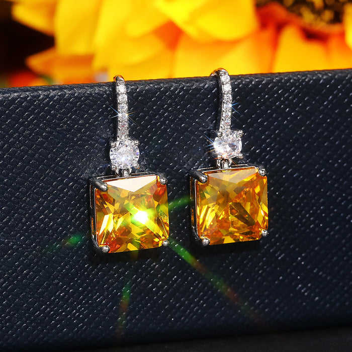 Pendientes de diamantes amarillos con forma de flor de hielo