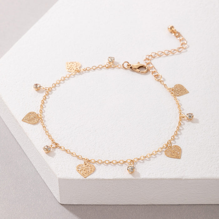 Flower and Heart Charm Anklet with Geometric Hollow Design