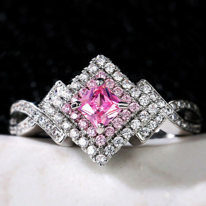 Anillo de diamantes rosas y circonitas en forma de cruz para mujer