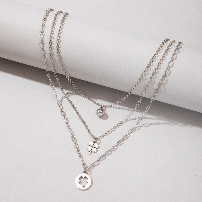 Layered Minimalist Pendant Necklace - Triple-Layer Fashion Statement Chain