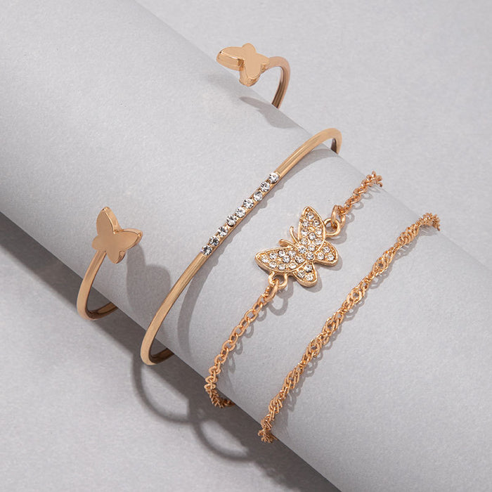 Gold Layered Bracelet Set - Four-Piece Rhinestone Butterfly Bangle for Women