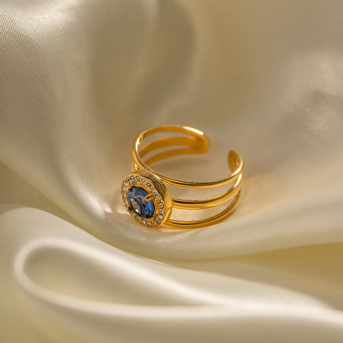 Anillo abierto de oro de 18 quilates con circonita azul redonda: estilo europeo y americano