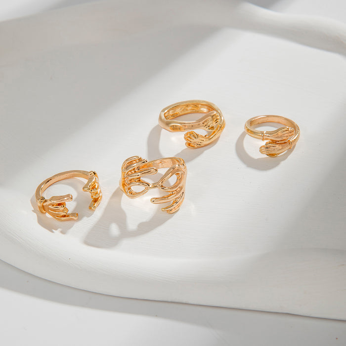 Design-Inspired Double-Hand Embrace Ring Set – Creative Hand-Palm Gold Open Rings, 4-Piece Collection