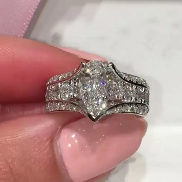 Anillo de diamantes simulados con circonita en forma de lágrima, anillo de bodas popular para mujeres