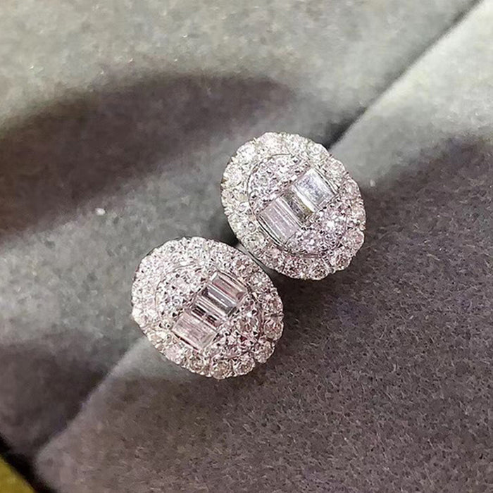 Conjunto de dos piezas de pendientes con circonitas ovaladas y diamantes