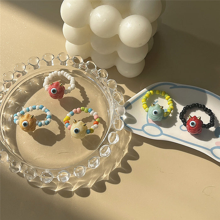 Funny little monster rice bead elastic index finger ring