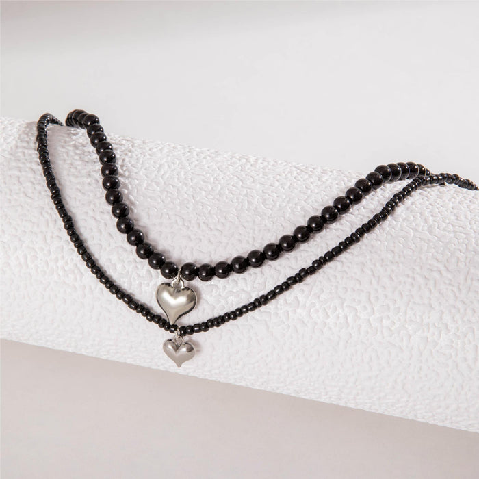 Vintage Black Beaded Heart Necklace with Layered Design