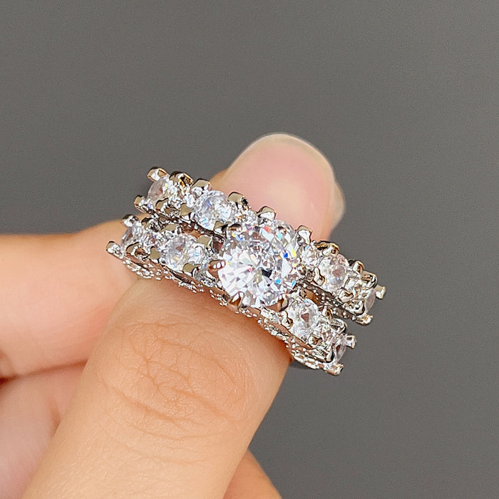 Anillo de pareja con ocho corazones y ocho flechas y circonitas cúbicas y diamantes