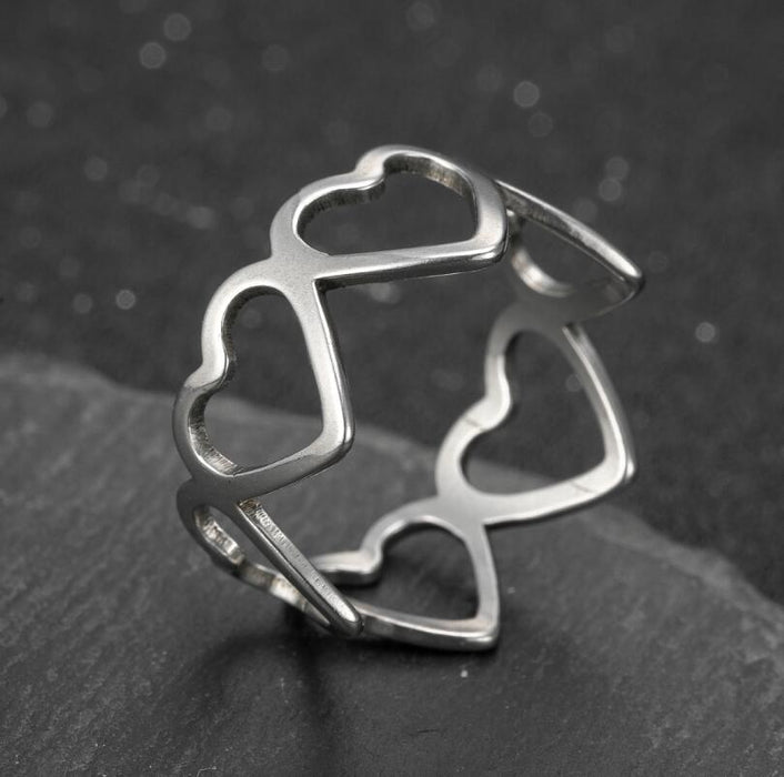 Love hollow rings, wholesale of women's open stainless steel simple rings