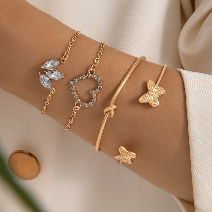 Luxe Heart and Leaf Bracelet with Butterfly Knot – Four-Layer Elegant Jewelry