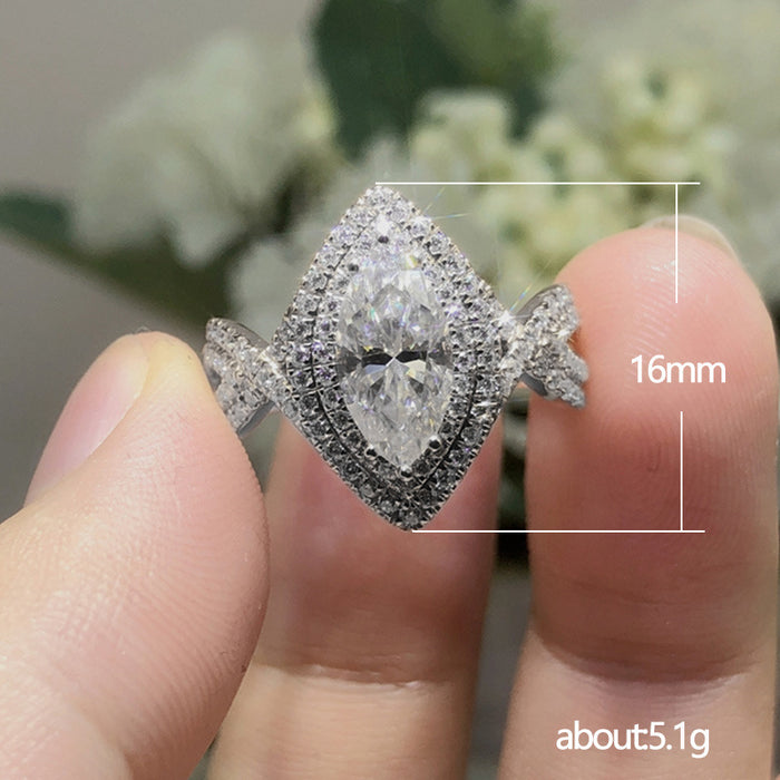 Anillo creativo de circonita con forma de ojo de caballo y cristal blanco para compromiso