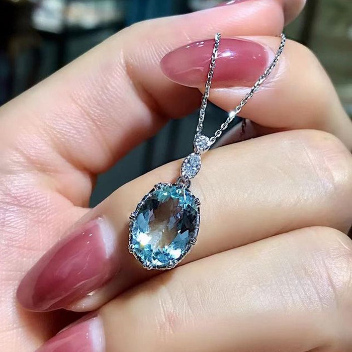 Light blue topaz inlaid zircon pendant necklace