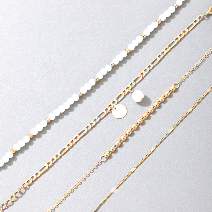 White Pearl Bead Pendant Bracelet Set - Four-Piece Jewelry Collection