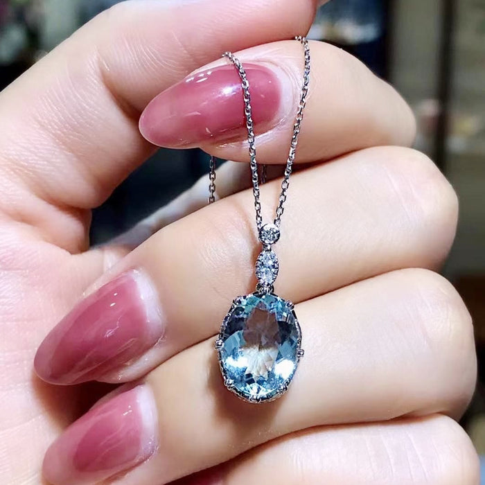 Light blue topaz inlaid zircon pendant necklace