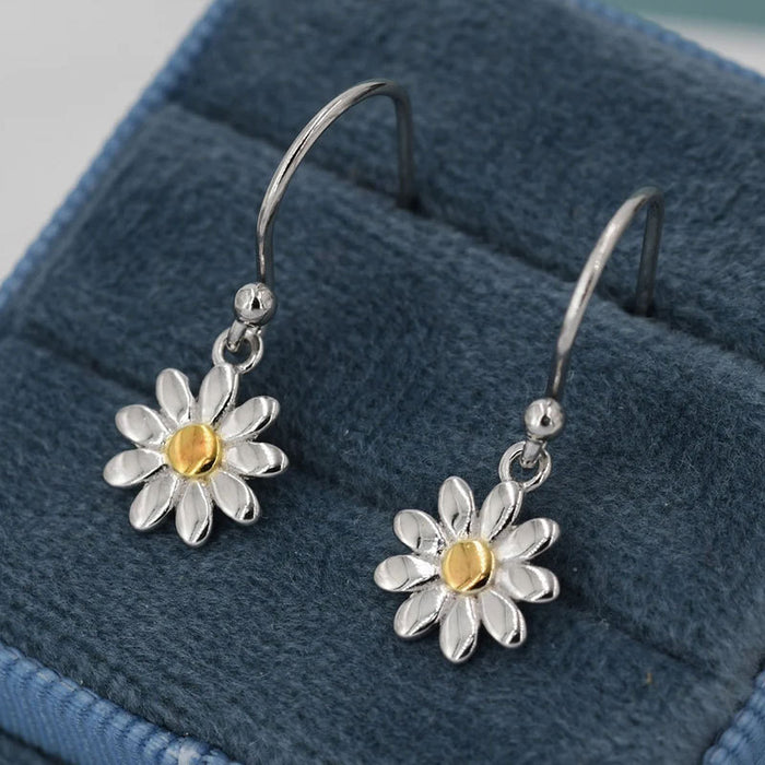 Pendientes de girasol y margaritas en dos tonos