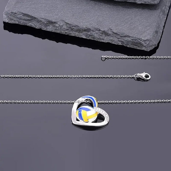 Collar deportivo con dije de voleibol en forma de corazón