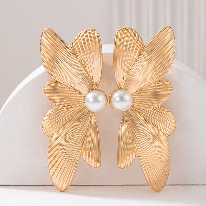 Pearl inlaid butterfly earrings geometric irregular alloy earrings