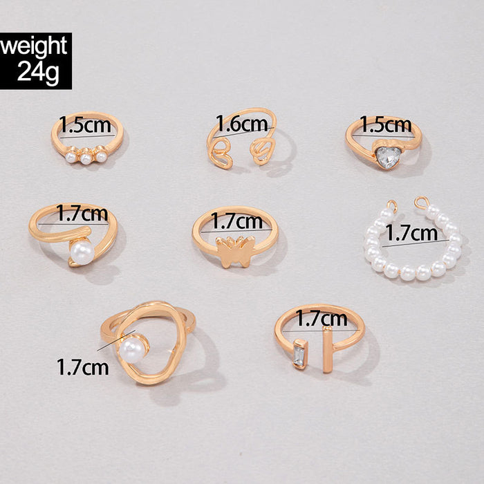 Pearl-inlaid hollow heart irregular opening eight-piece ring set