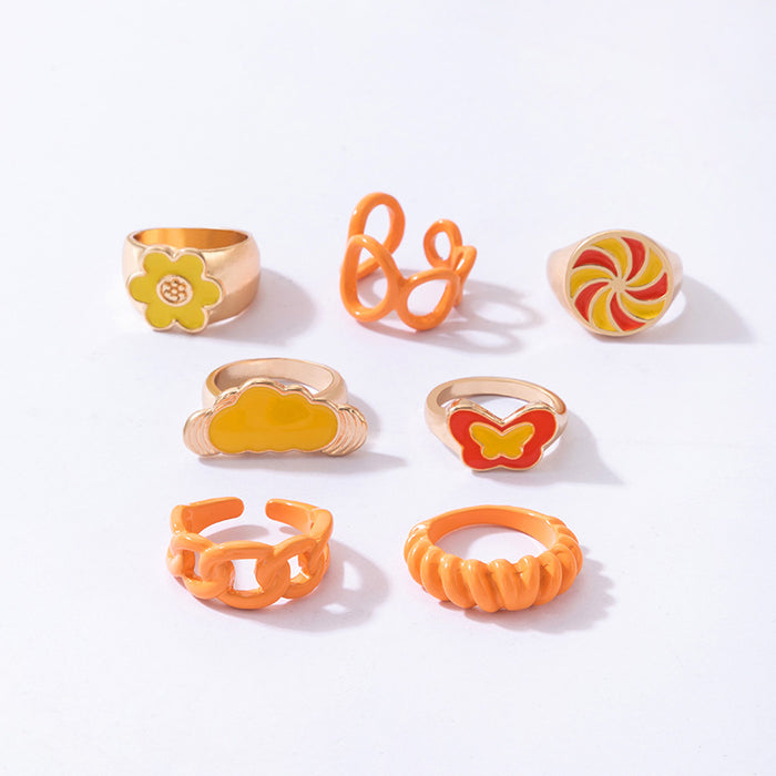 Juego de 7 anillos geométricos abiertos pintados con spray de aceite de color naranja