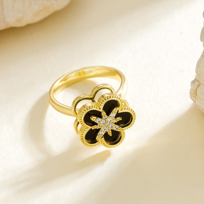 Wholesale black eight-pointed star five-petal flower rotating open ring