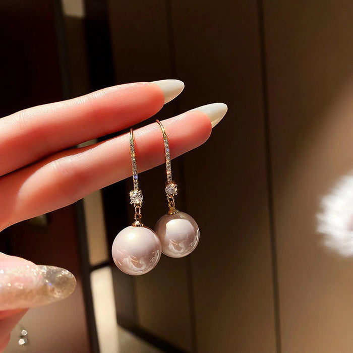 Pearl and zircon earrings