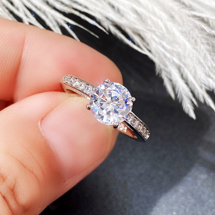 Anillo de bodas de cuatro garras con diamantes y anillo de compromiso de ocho corazones y ocho flechas