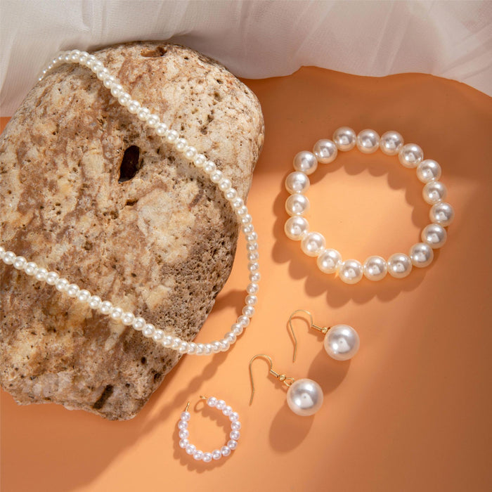 Elegant Pearl Necklace Set with Bracelet and Earrings - Four Pieces