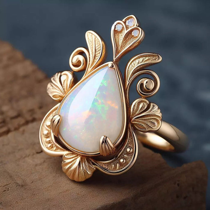 Women's water drop leaf three-claw micro-inlaid imitation opal ring