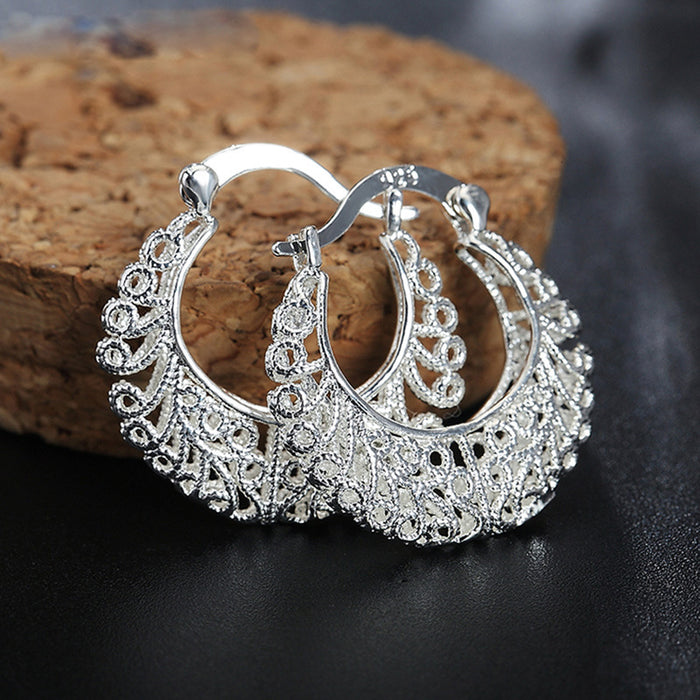 Women's hollow woven pattern earrings