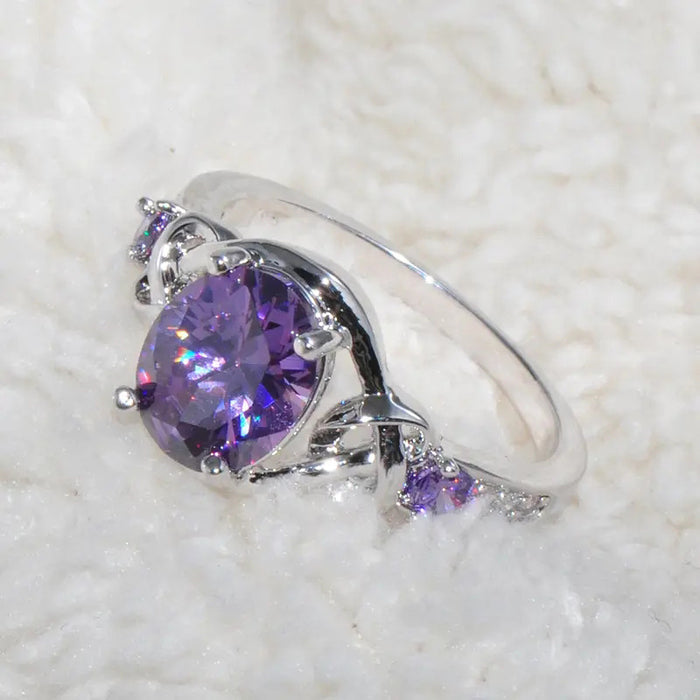 Anillo de princesa morado con incrustaciones Anillo de bobinado ovalado europeo y americano