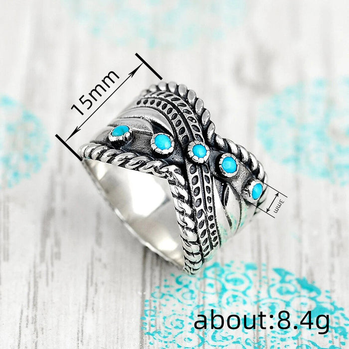 Women's imitation turquoise twisted lock edge vintage ring