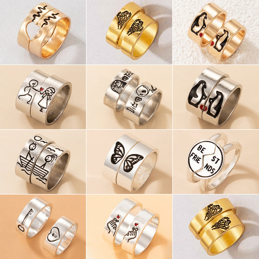 Juego de anillos con letras geométricas en forma de pareja de enamorados