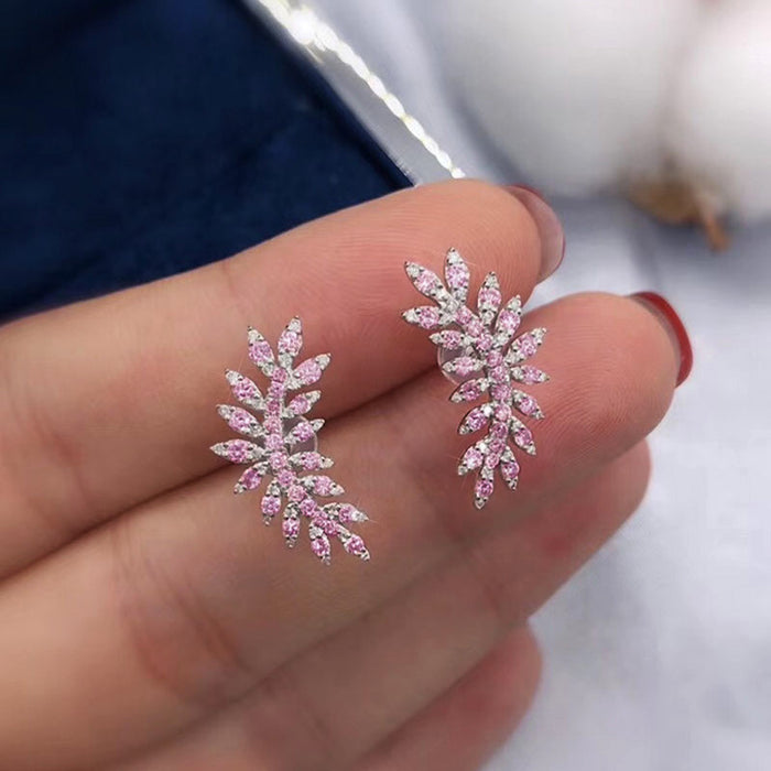 Pendientes vintage de plumas y flores