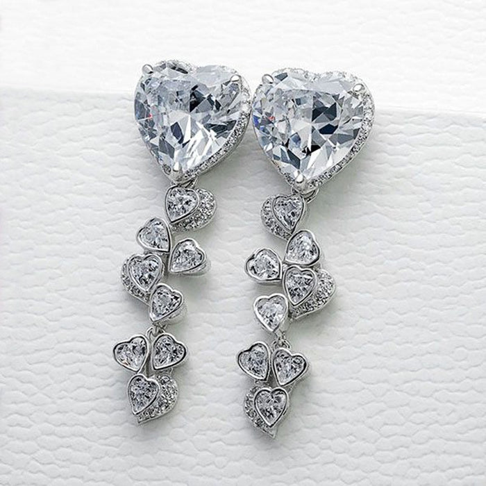 Pendientes largos con borlas y circonitas Love