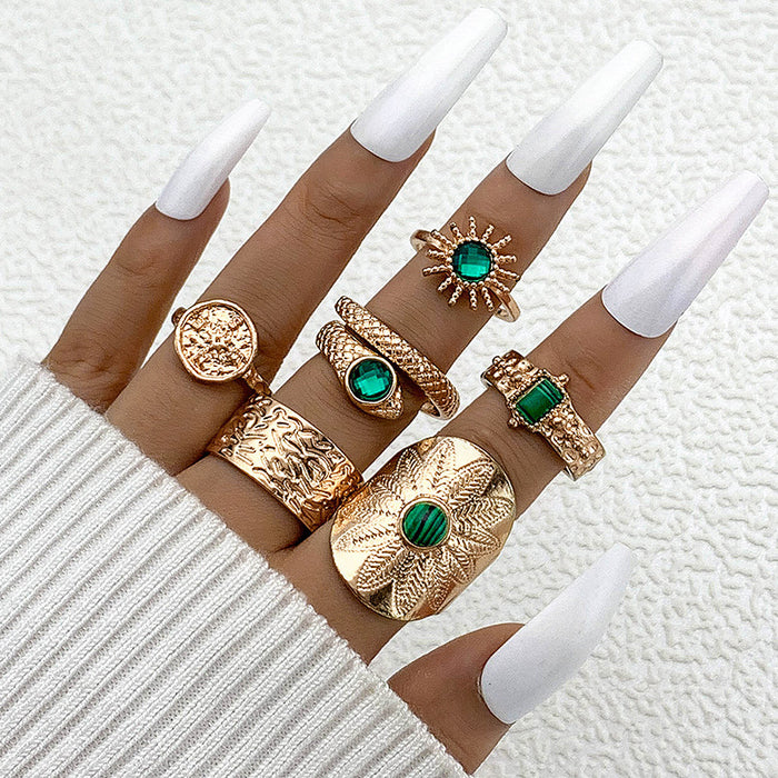 Conjunto de anillos de serpiente con piedras preciosas verdes retro: conjunto punk de cuatro piezas para mujer