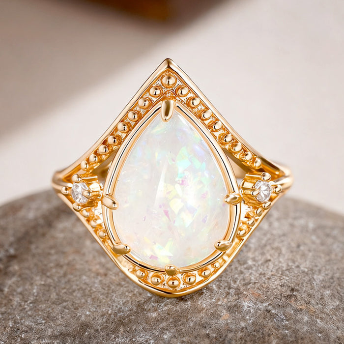 Women's teardrop multi-claw inlaid imitation opal ring