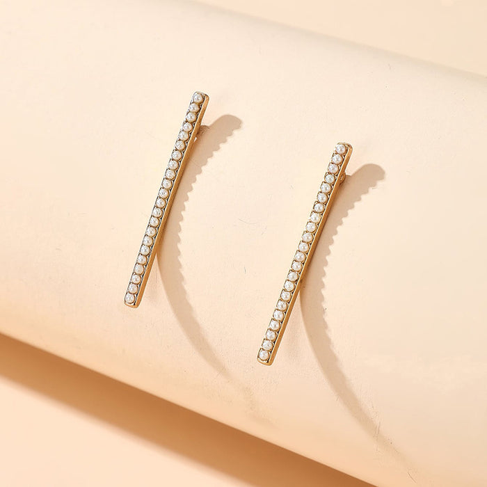 Pearl stud earrings geometric symmetry