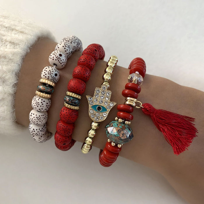 Conjunto de pulseras étnicas con cuentas: joyas de cuatro piezas con borlas y ojos para mujer