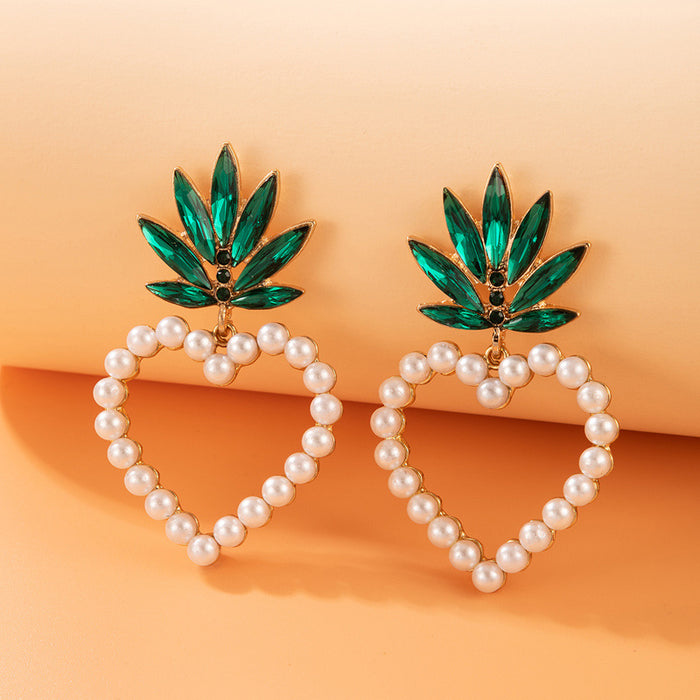 Pearl heart earrings with diamond leaf studs