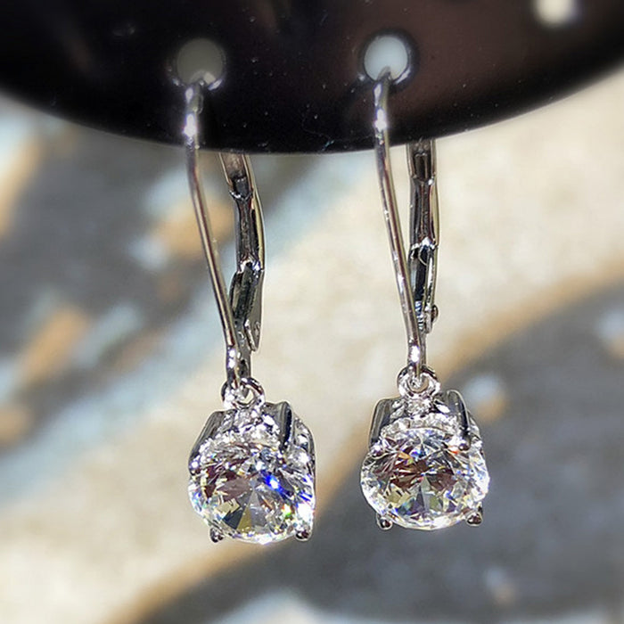 Classic four-claw zircon earrings