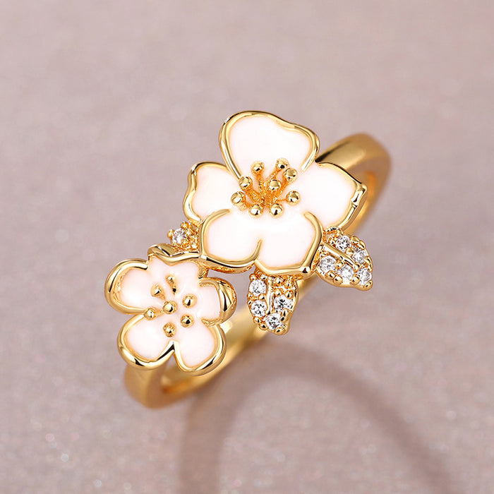 Anillo de estilo hada coreano con diseño de camelia dulce y estilo de celebridad