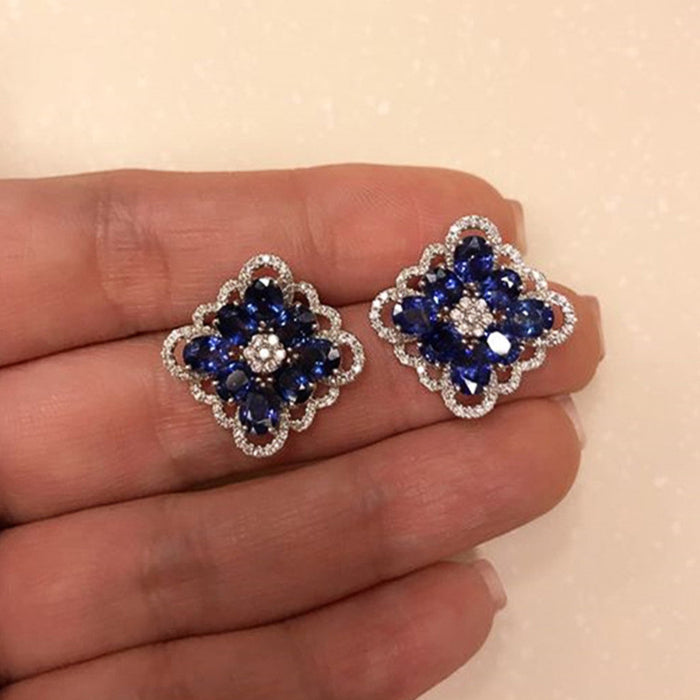 Blue enchantress flower earrings