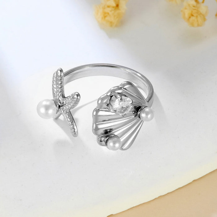 Wholesale stainless steel 18K gold scallop rings set with white beads