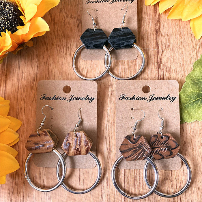 Vintage Embossed Leather Earrings with Metal Hoop Design