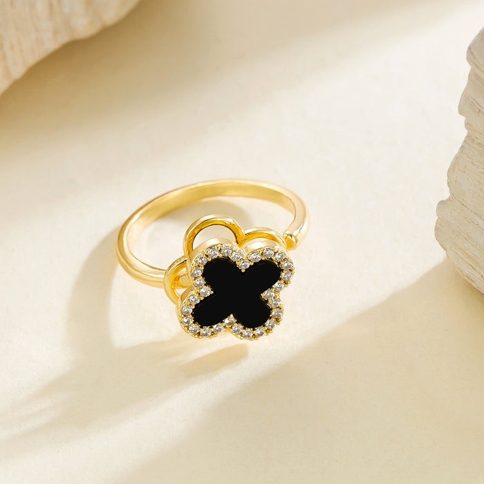 Wholesale black four-leaf clover micro-pave rotating open ring