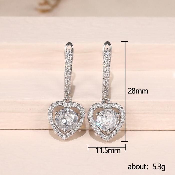 Hollow heart-shaped zircon earrings