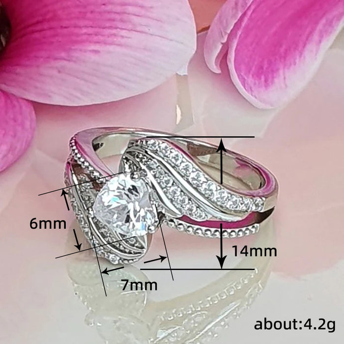 Anillo de amor con alas de plumas de ángel